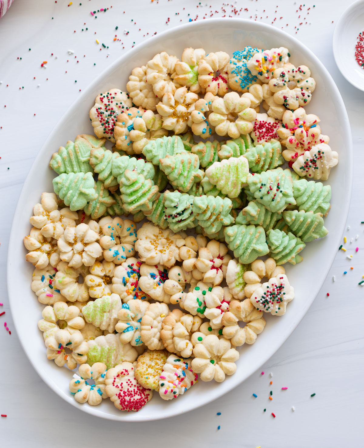 A platter of holiday almond spritz cookies