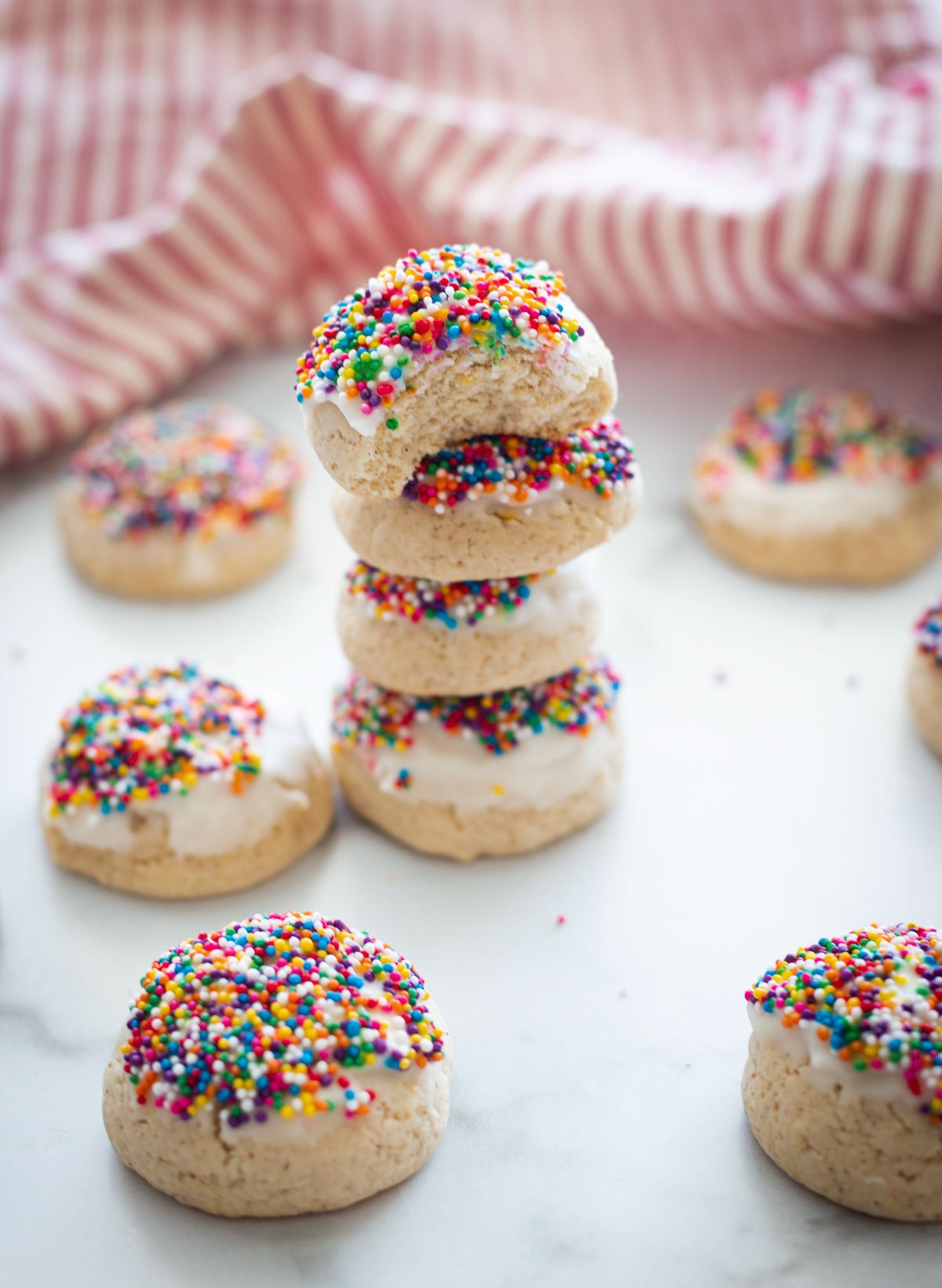 A stack of decorated anish cookies. 