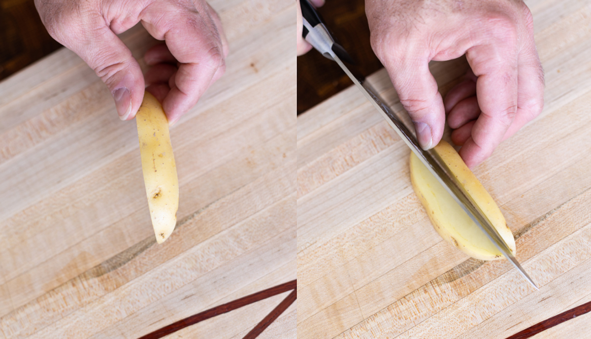 Slicing the potatoes into wedges for steak fries. 